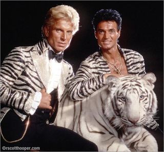 Siegfried and Roy with white tiger