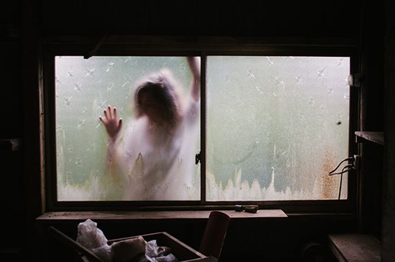 Woman trapped in a window